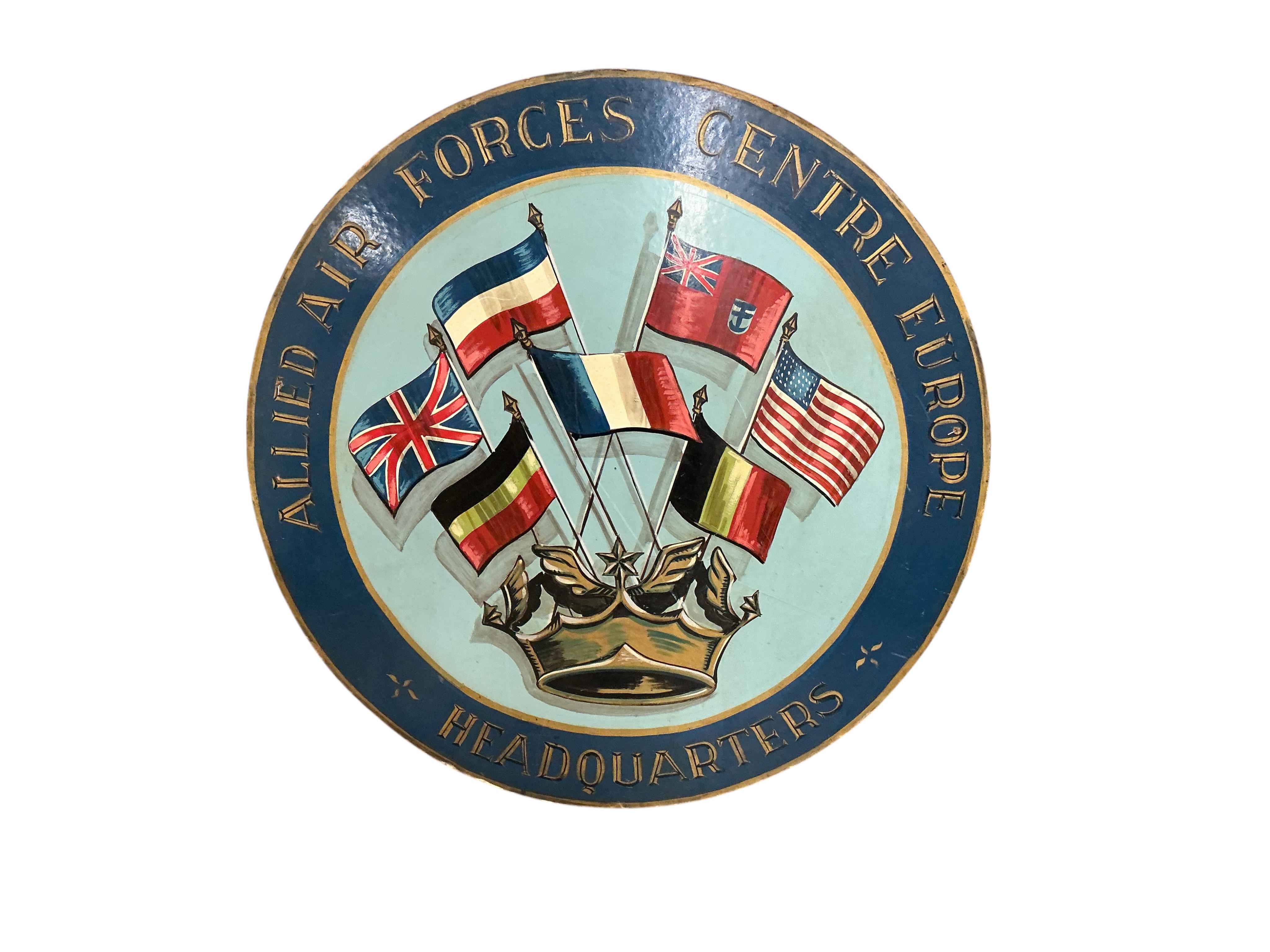 A circular painted Allied Air Forces Centre Europe sign, diameter 120cm